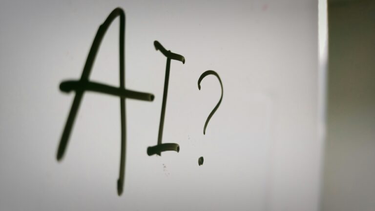 Ai written on a whiteboard with a question mark